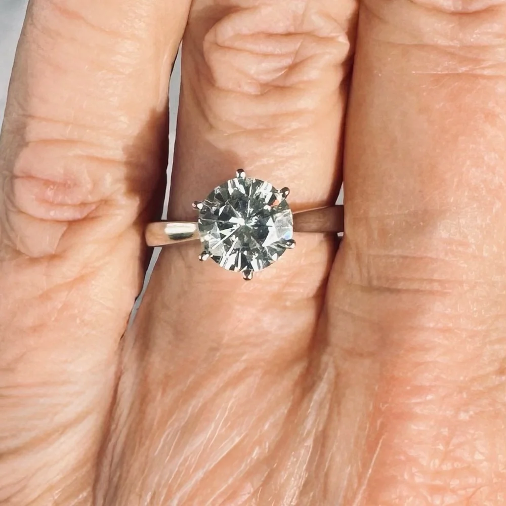 Stunning 14K White Gold Solitaire Ring